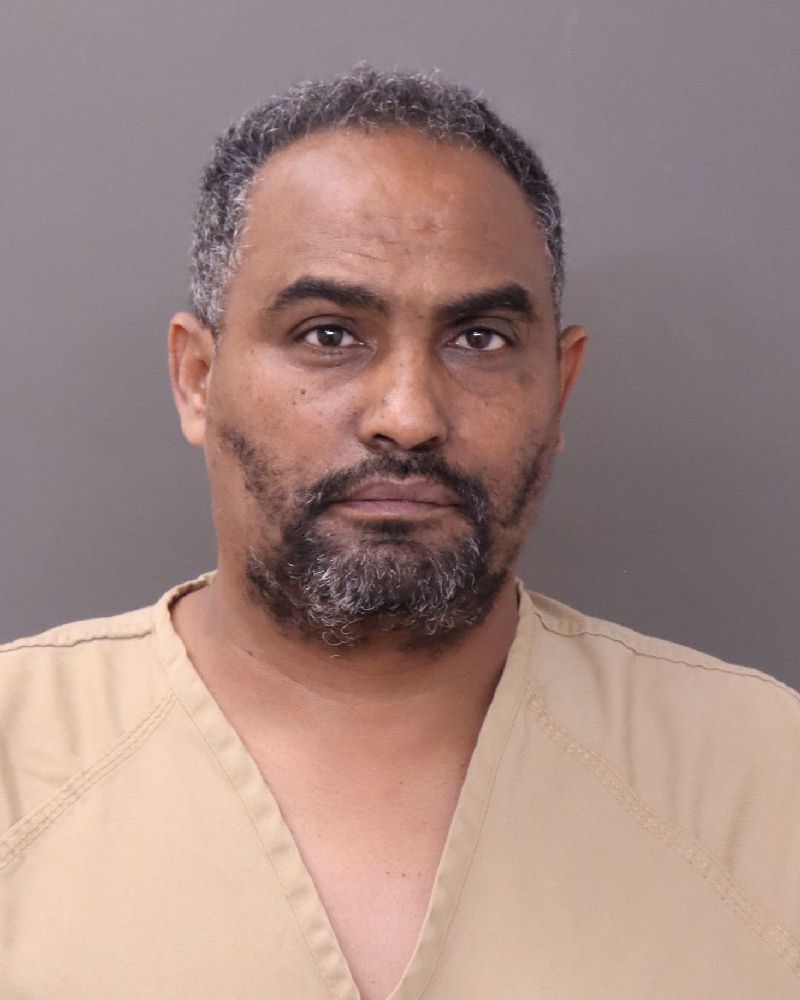 Booking photo of Mulugeta Tsegay Hagos