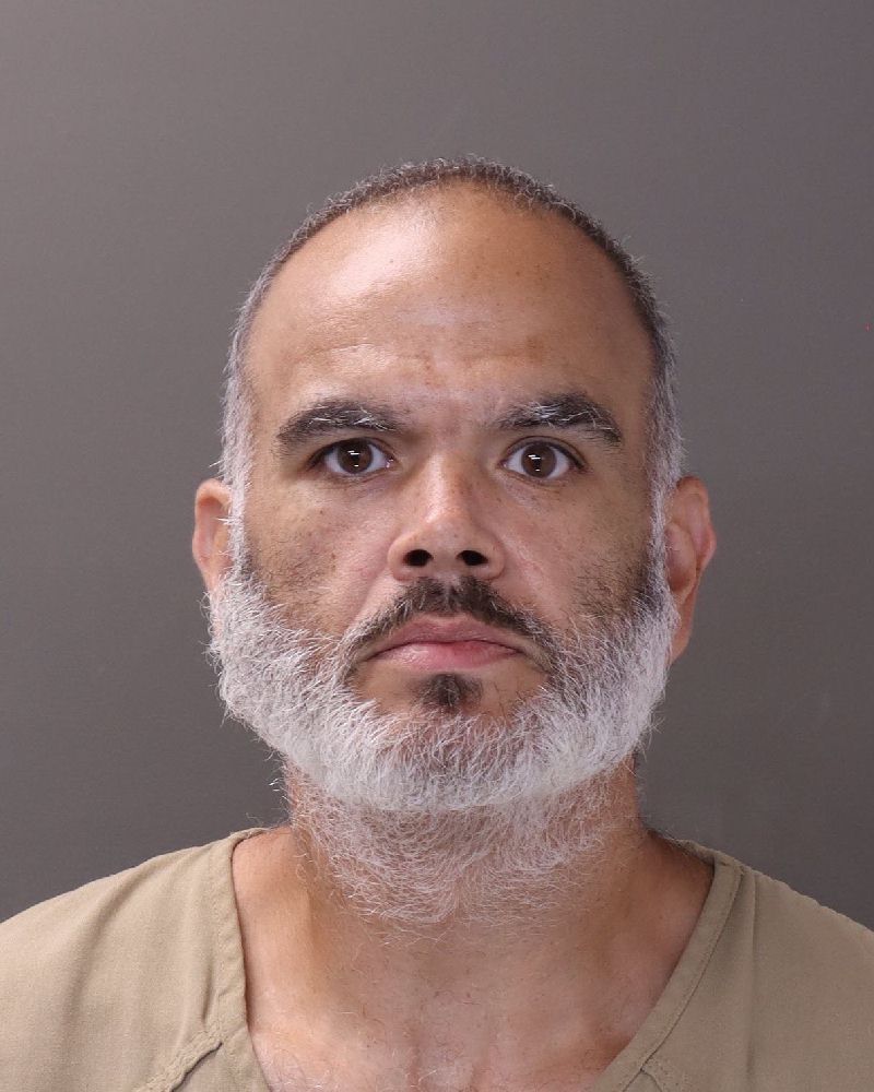 Booking photo of Brett Red