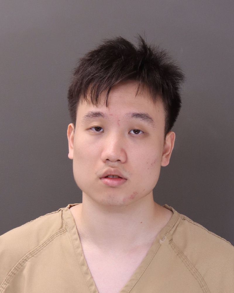 Booking photo of Qiyang Jiang