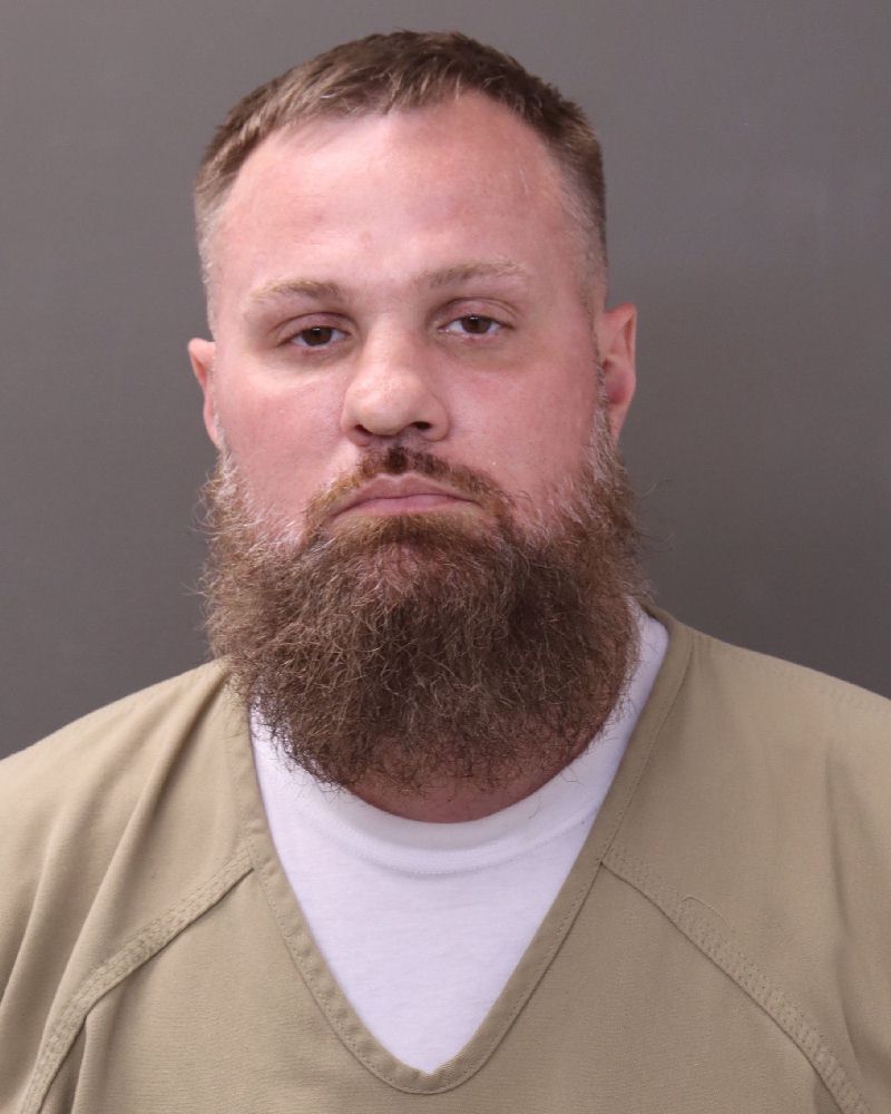Booking photo of Christopher Ryan Dean