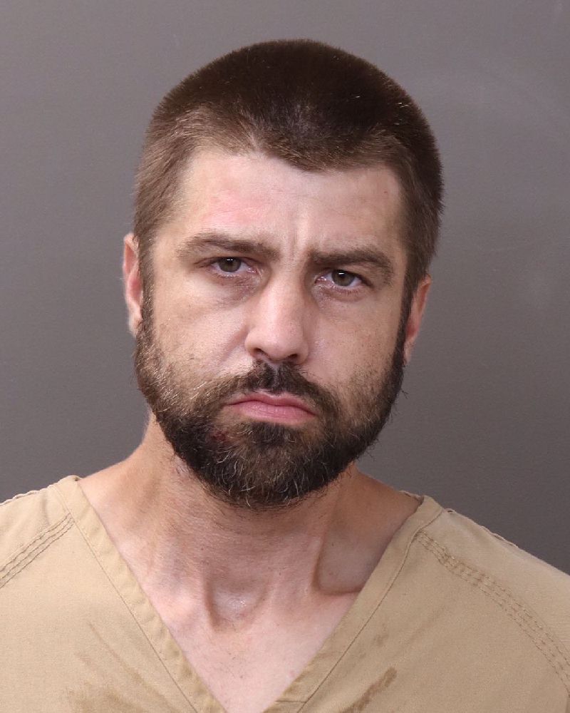 Booking photo of Adam Fessler