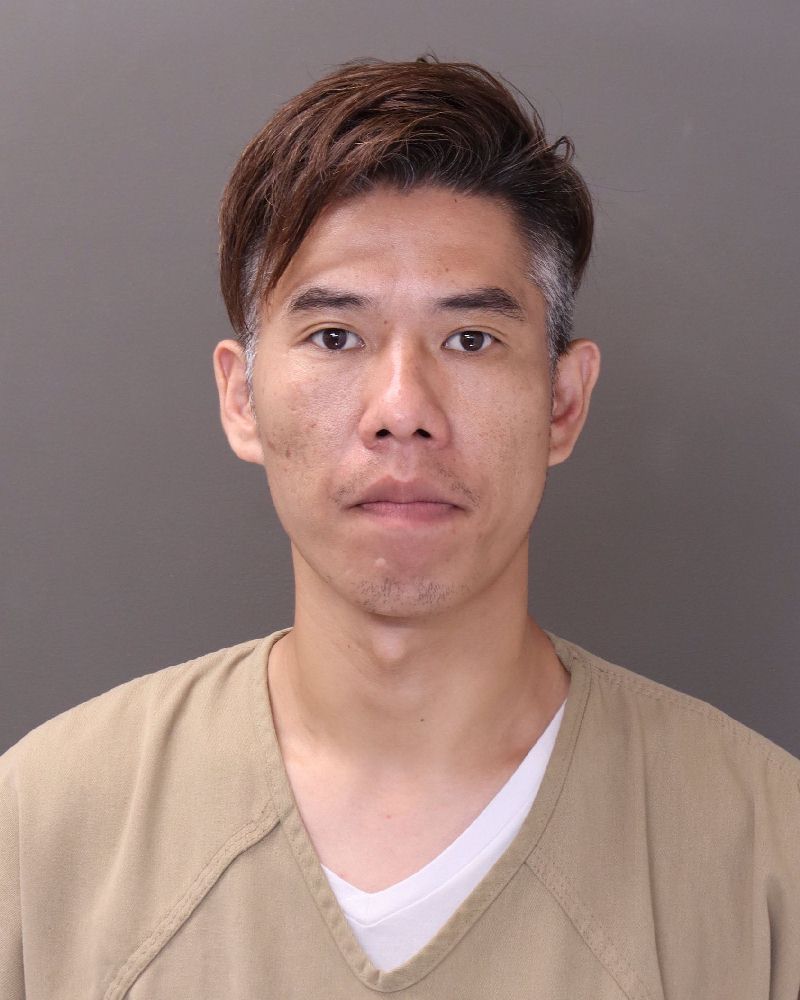Booking photo of Xiao Jun Liang