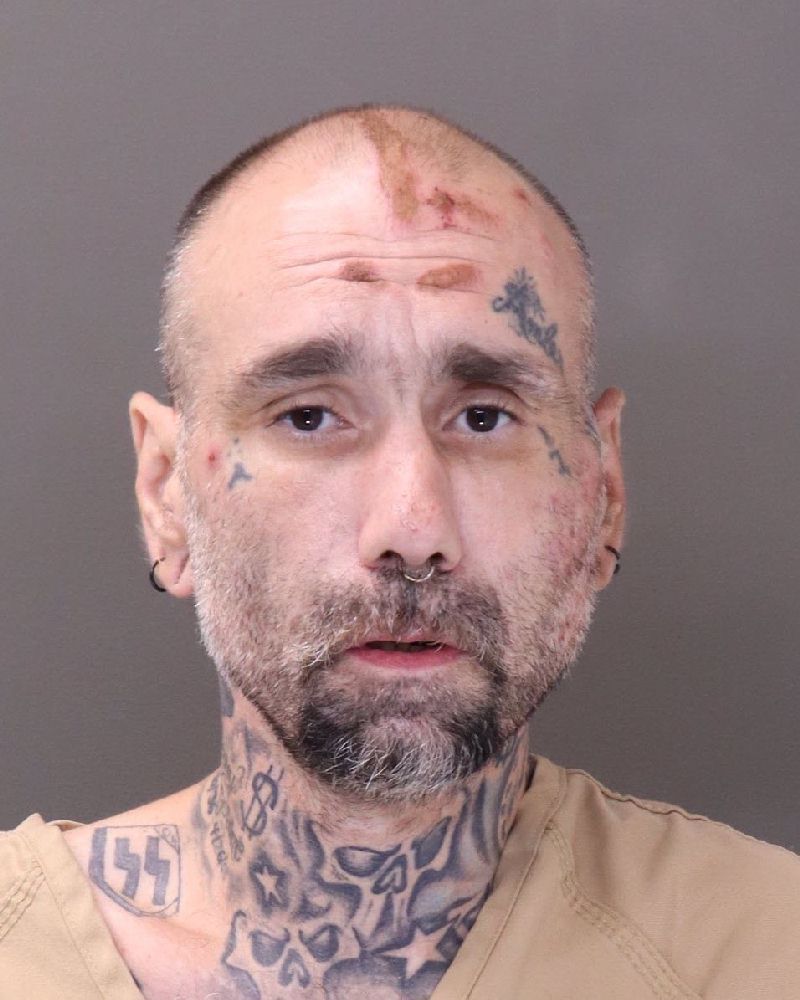 Booking photo of Justin Keith Mann