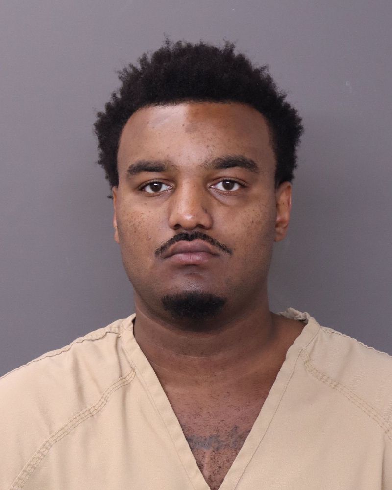 Booking photo of Eric Lewis Jr Simuel