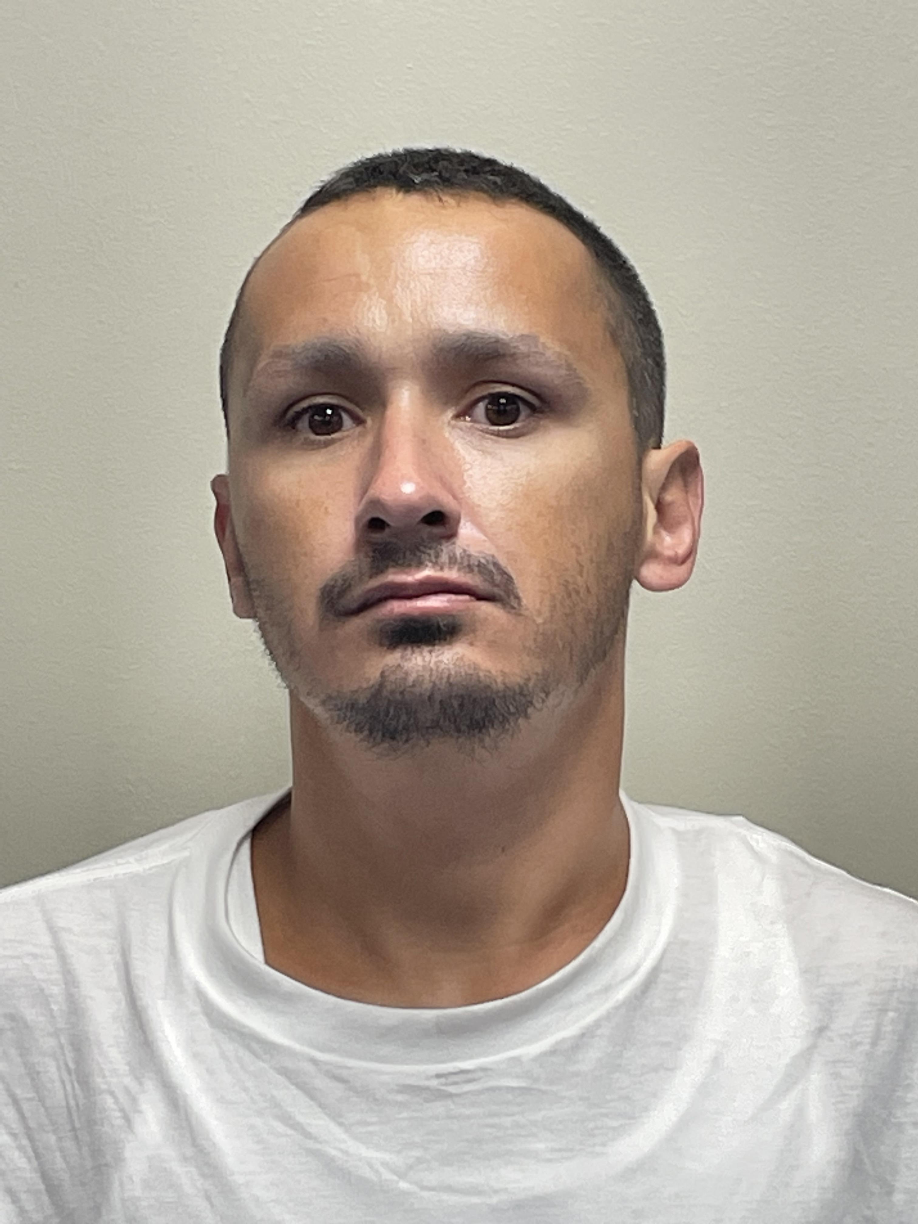 Booking photo of Justin Poyadou