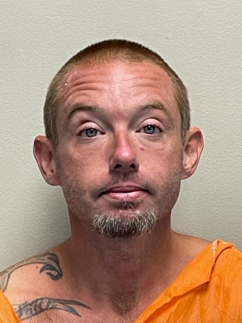 Booking photo of Derek Moss