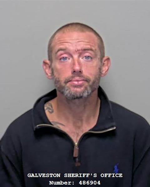 Booking photo of Derek Moss