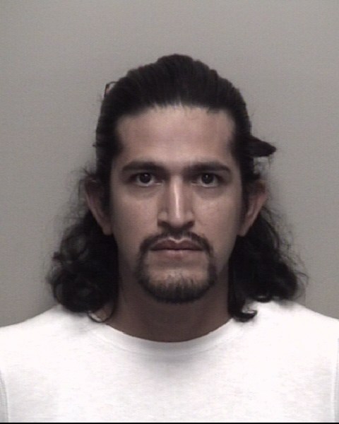 Booking photo of Michael Baeza