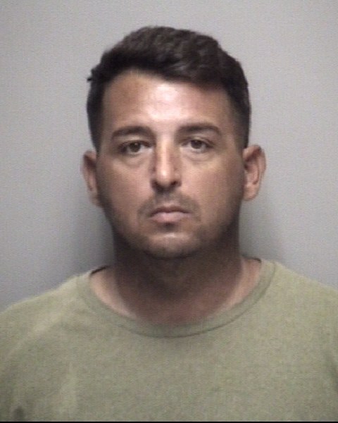 Booking photo of Timothy Carlton
