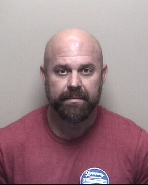 Booking photo of Jimmy Rogers