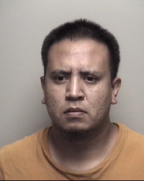 Booking photo of Carlos Torres Alvarez