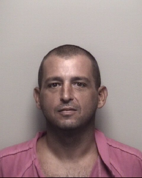 Booking photo of Timothy Carlton