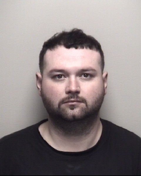 Booking photo of Roman Flores