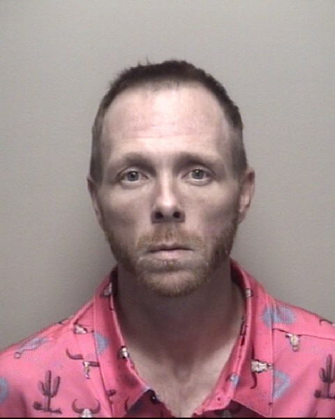 Booking photo of John Miles