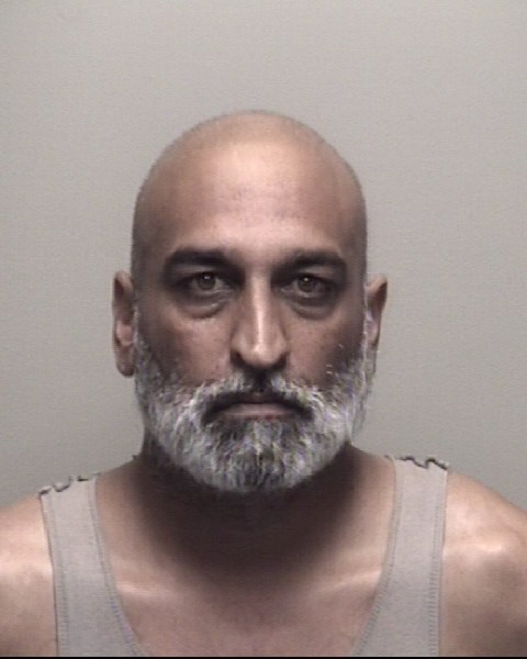 Booking photo of Richard Kissoondath
