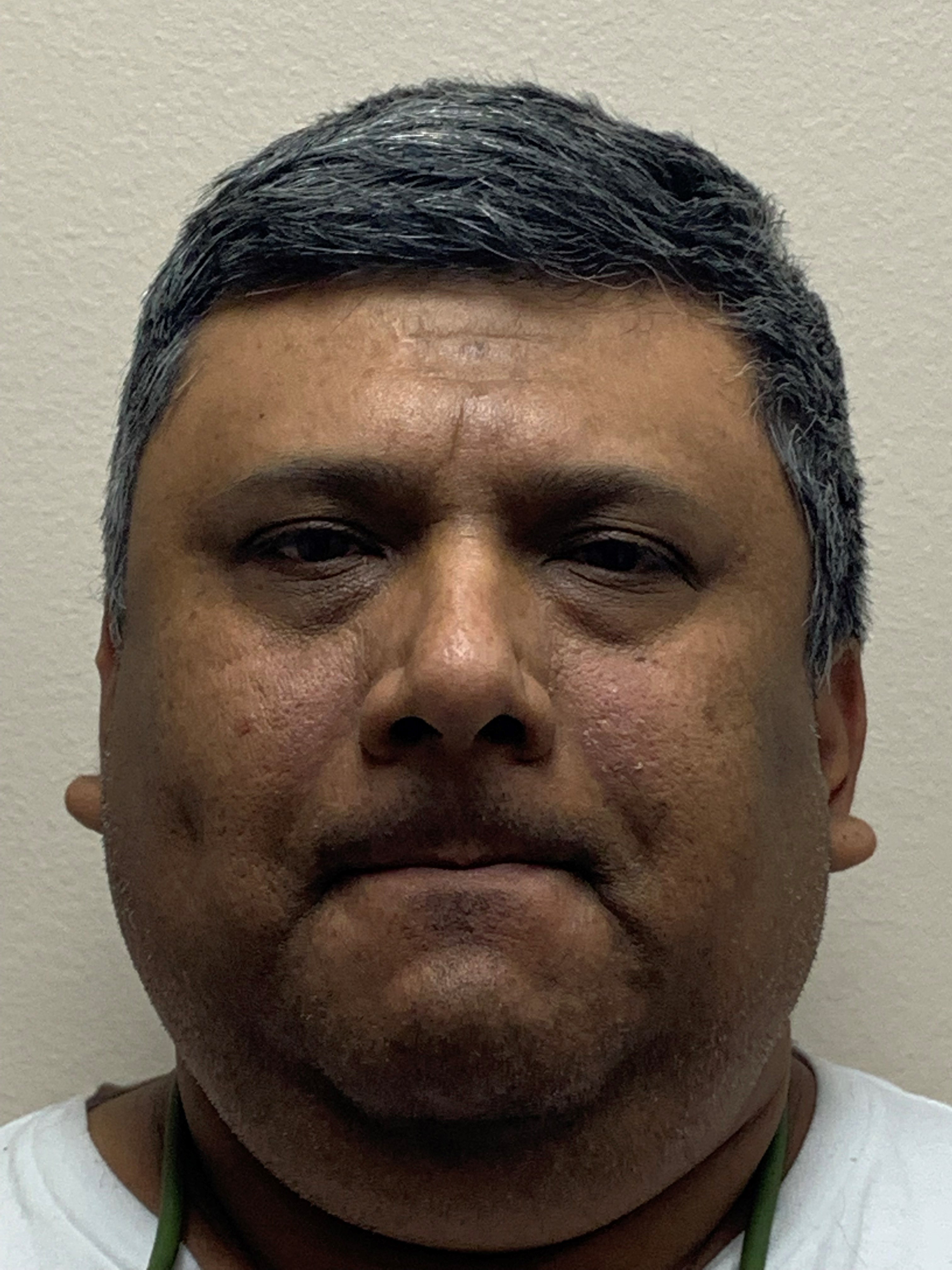 Jose Flores booking photo