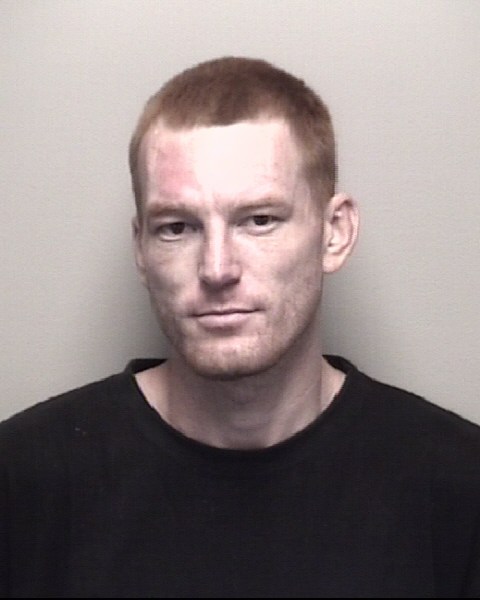 Booking photo of Travis Vossler