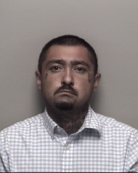 Booking photo of Carlos Morales