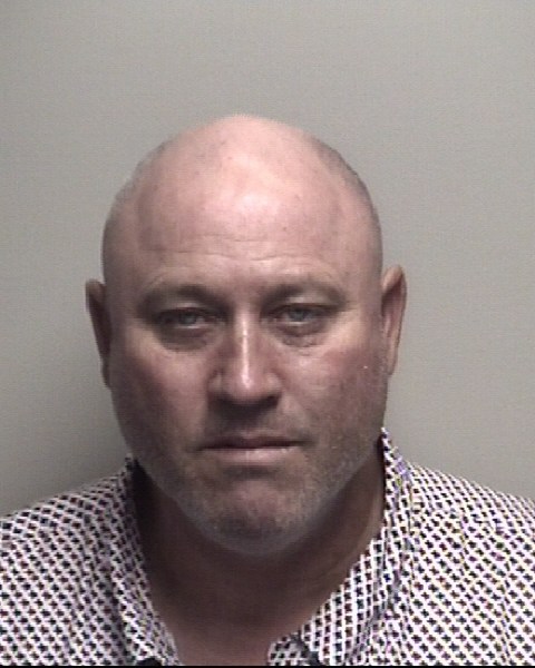 Booking photo of Brett Barker