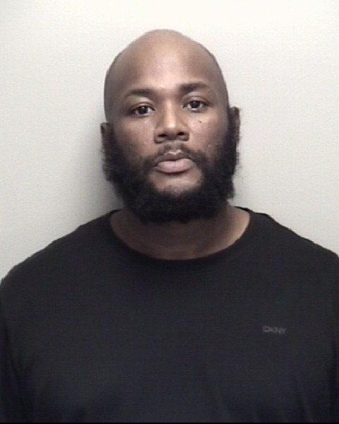 Booking photo of Brandon Johnson
