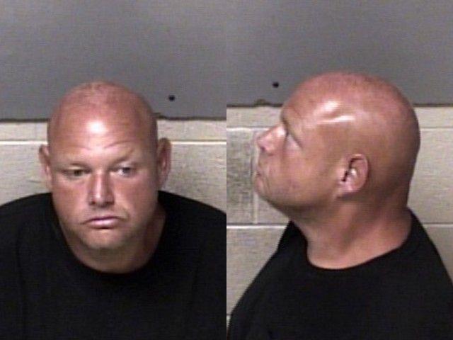 Booking photo of Dennis Poston