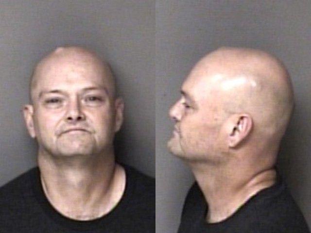 Booking photo of Tony Huggins