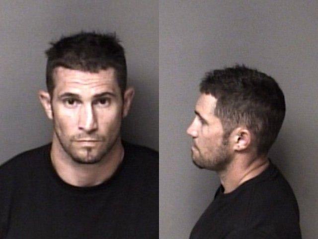 Booking photo of Jon Brewer