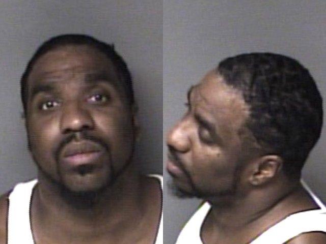 Booking photo of Alex Mccoy