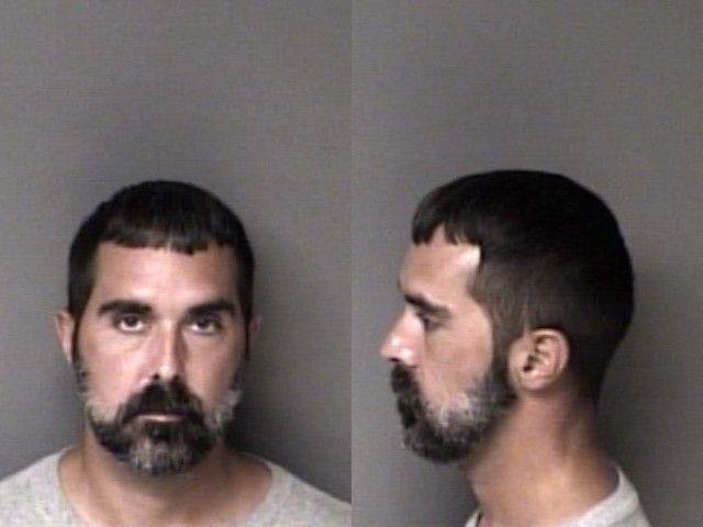 Booking photo of Andrew Peterson