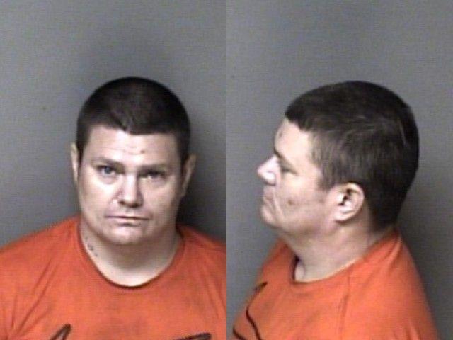 Booking photo of Christopher Cox