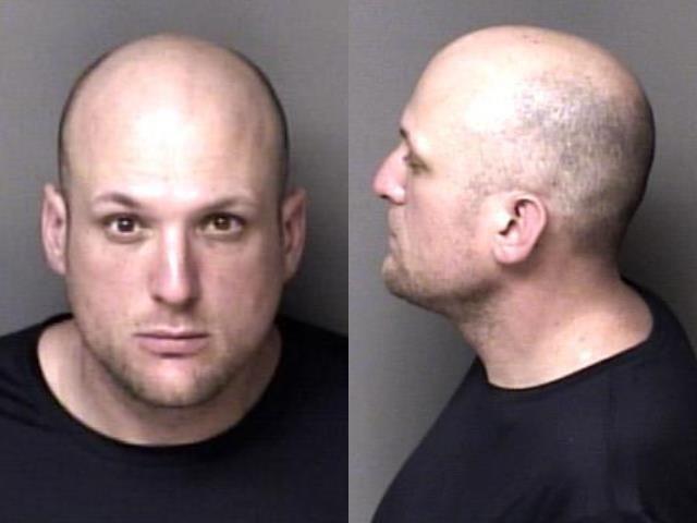 Booking photo of Jonathan Miller