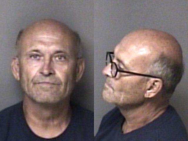 Booking photo of Thomas Moss