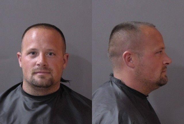 Booking photo of Jon Carnahan