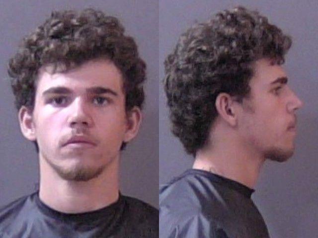 Booking photo of Xavier Tharp