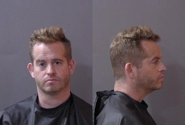 Booking photo of Dustin Mills