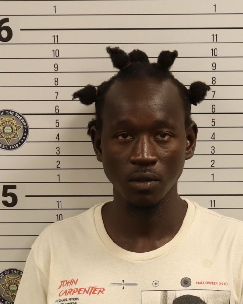 Booking photo of Charles A Odokopira