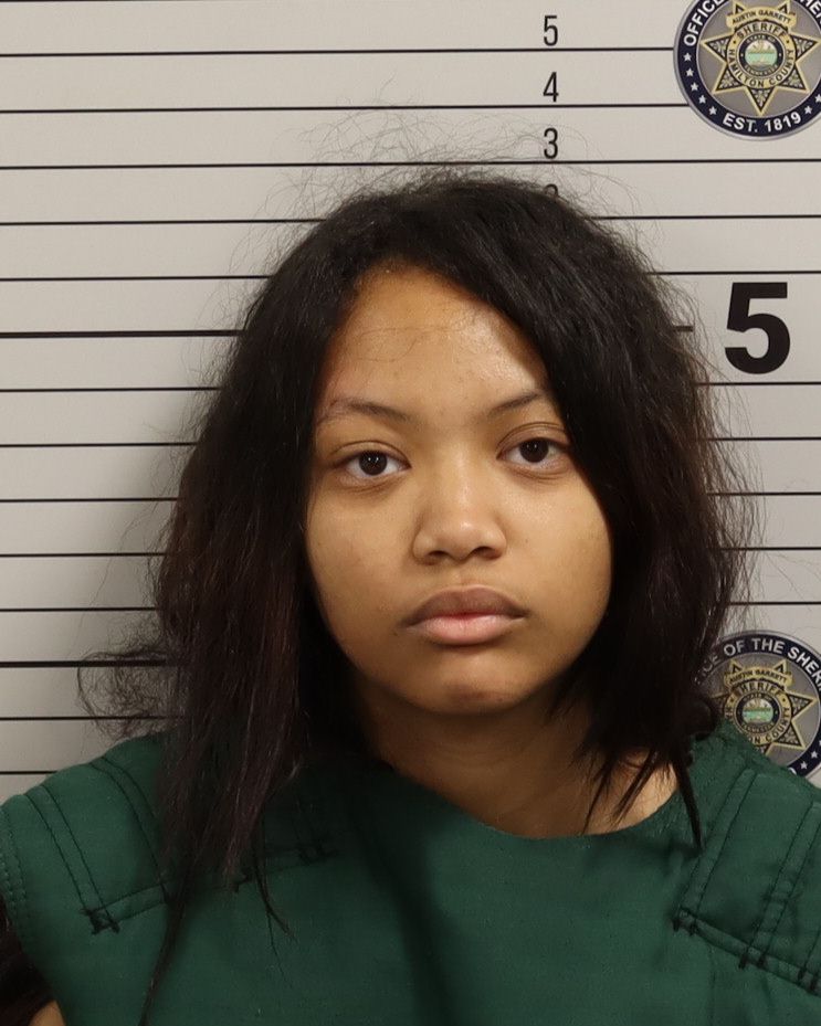 Booking photo of Meiling K Pinheiro