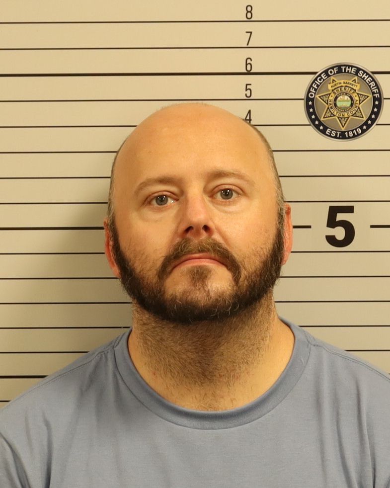Booking photo of Justin Ryan Hill