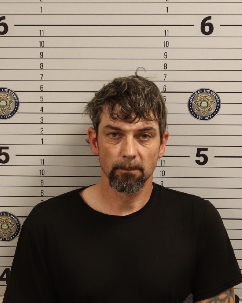 Booking photo of John William Haggard