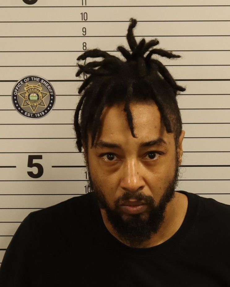 Booking photo of Christian Dionte Woods