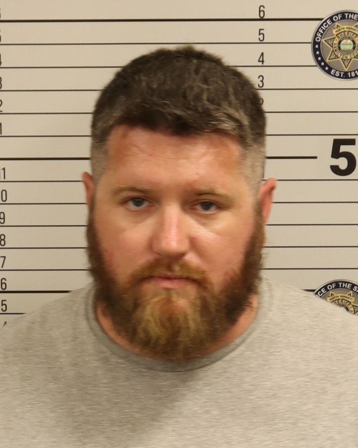 Booking photo of Aaron Kurt Hughes