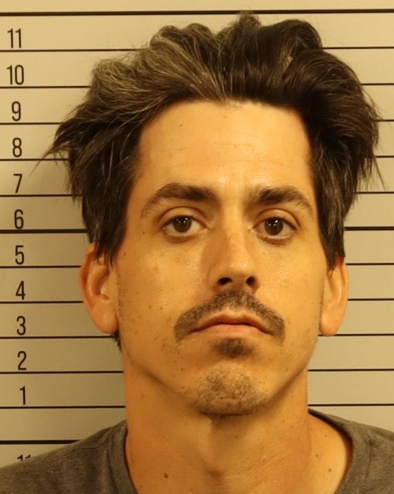 Booking photo of Justin Travis Wright