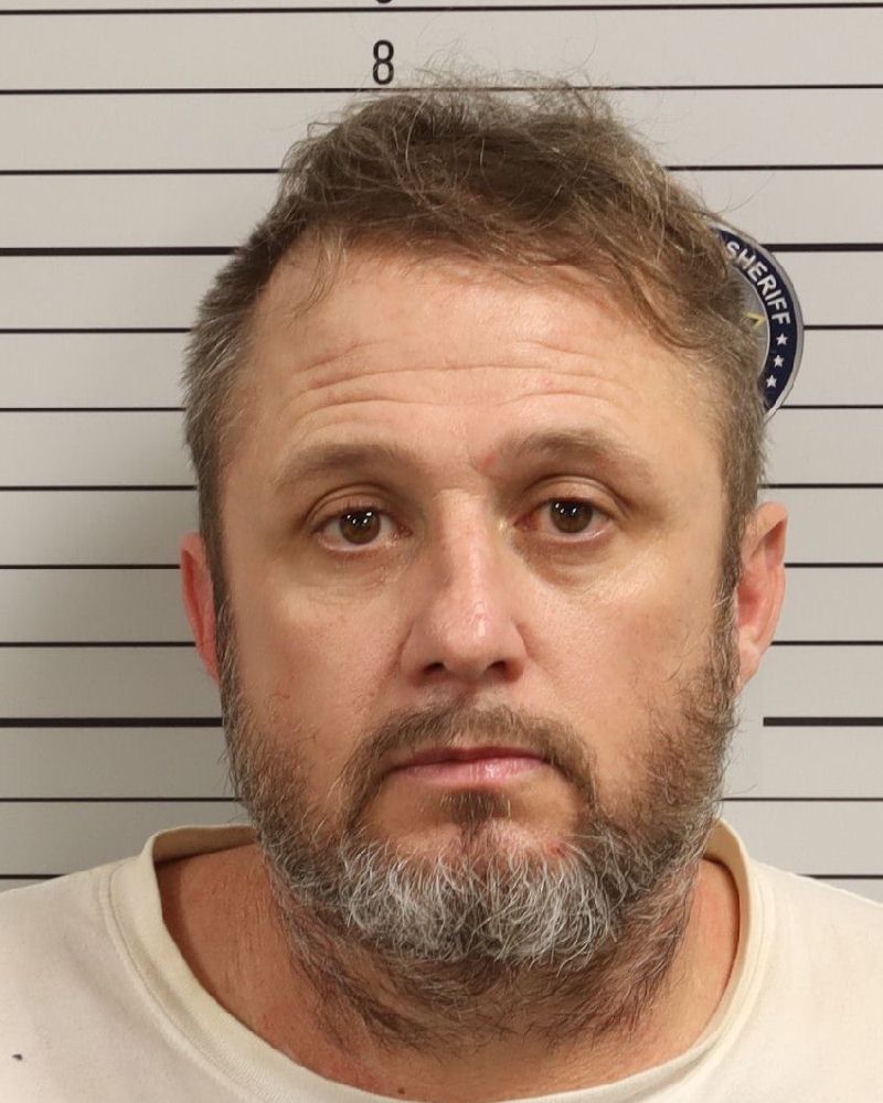 Booking photo of John Evan Adams