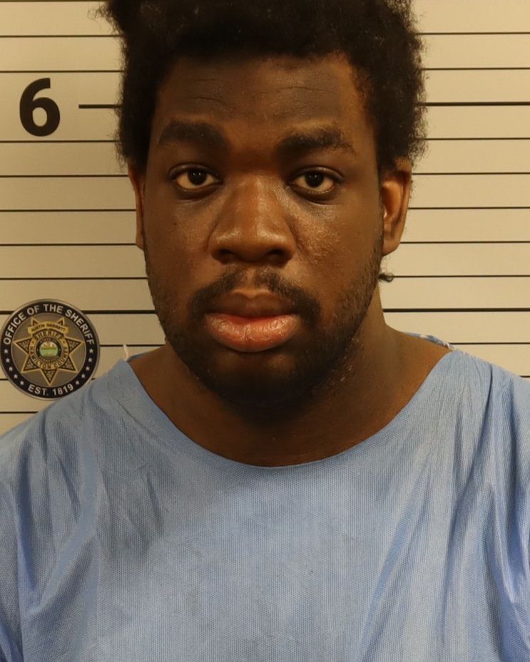 Booking photo of John Hector Williams