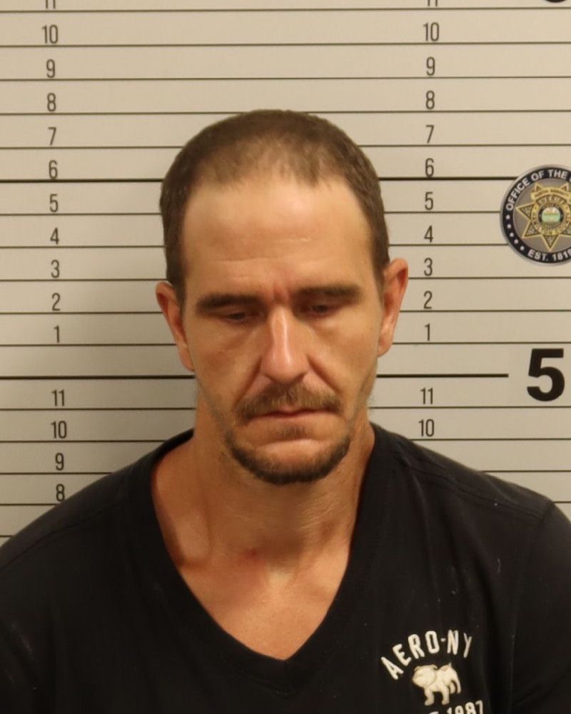 Booking photo of Christopher Michael Hughes