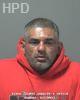 Booking photo of Carlos Basulto