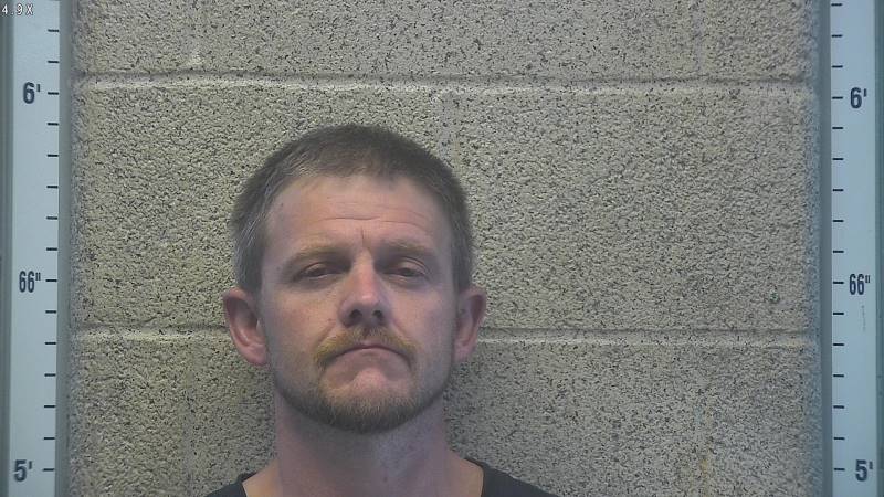 Booking photo of Darrin Dossett