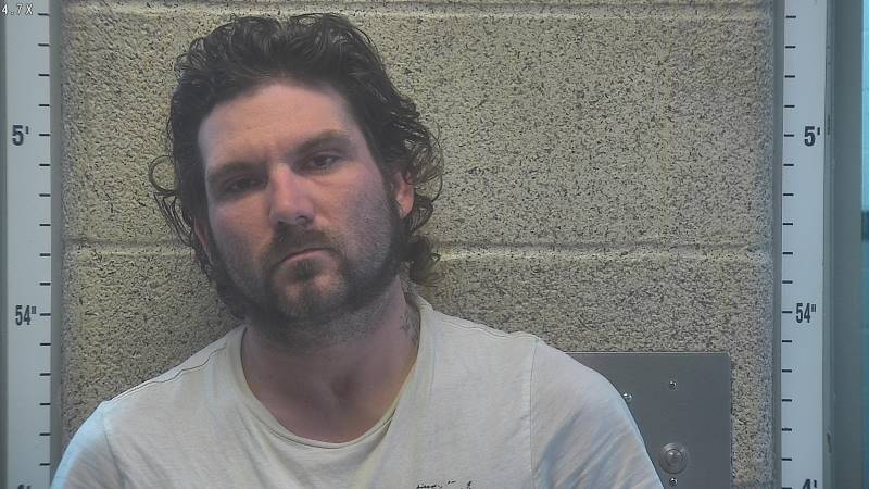 Booking photo of Travis Hill
