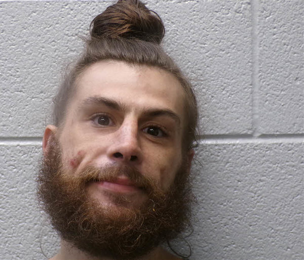 Booking photo of James West