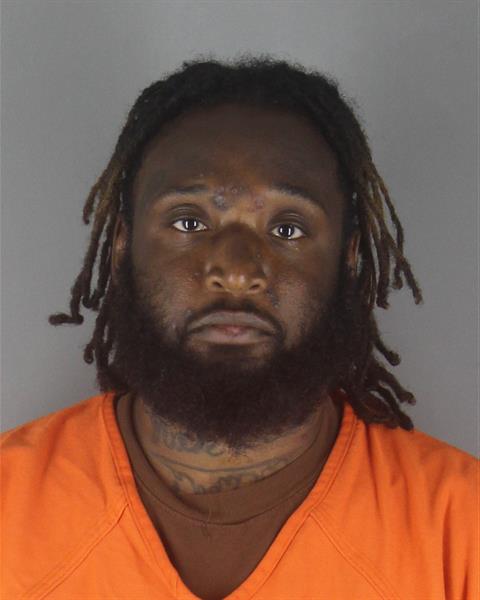 Booking photo of Travis Neloms